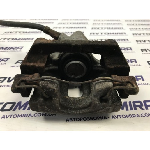 Суппорт тормозной задний правый Ford Focus 3 2011-2017 8M512M088